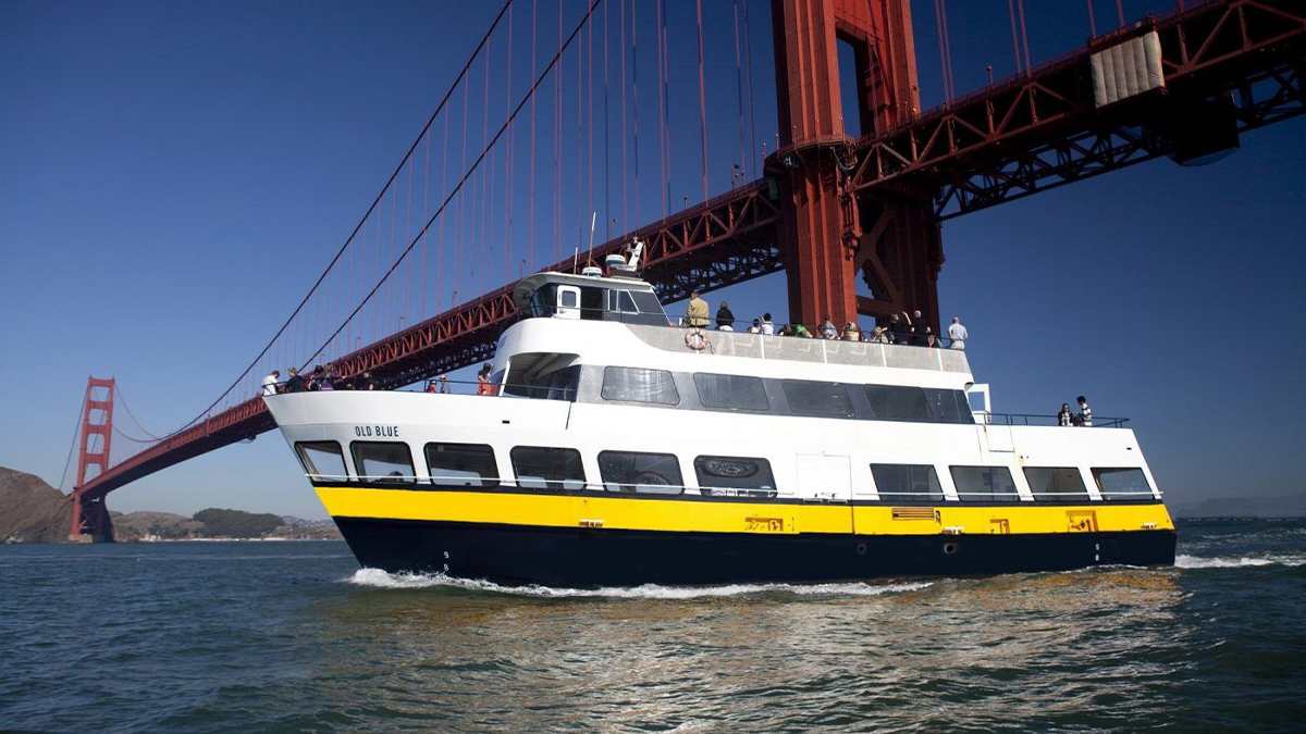 close up of Old Blue ship part of the Blue and Gold Fleet under the Golden Gate Bridge in San Francisco, California, USA